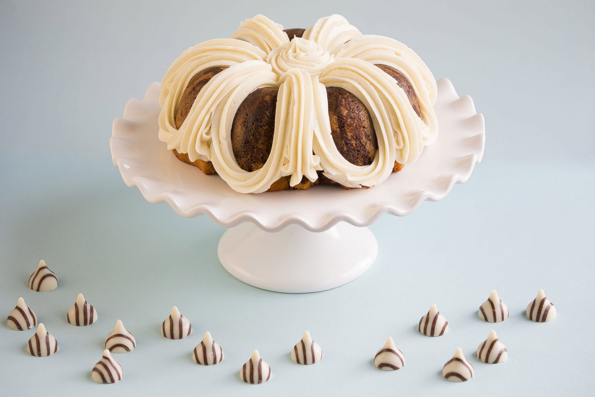 Treat yourself to rich Gluten-free Double Chocolate Bundt cake with fudgy mini morsels perfectly paired with our signature buttercream frosting and finished with a chocolate chip on top. A perfect blend of flavors and textures, it will satisfy your sweet cravings and it's Gluten-free.
